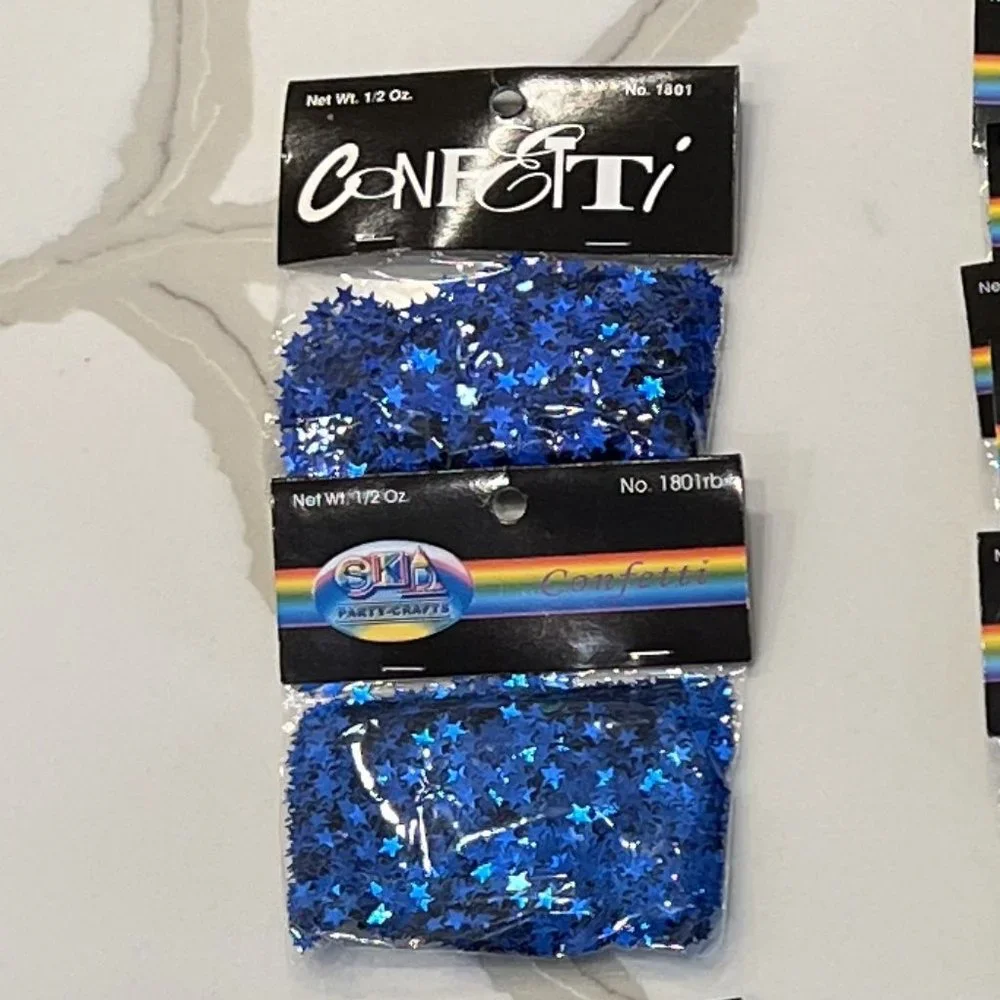 23 - 1/2 oz Packages of Star Shaped Confetti - Blue Red Silver Gold
